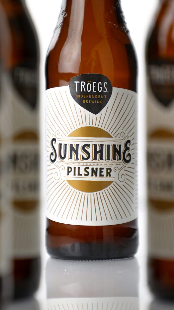 Wallpapers and lock screens - Sunshine Pils bottle.